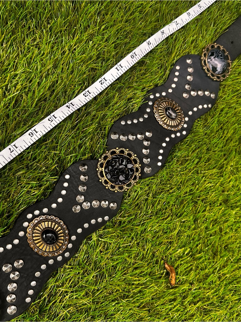 Black Leather Belt with Gold-Tone Oval Buckle and Decorative Accents - Picture 5 of 7